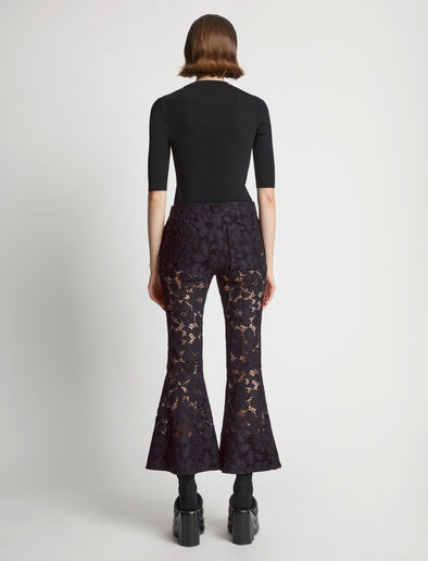 Back image of model wearing Lace Pants in black