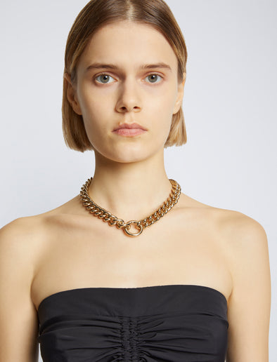 Detail image of model wearing Chain Detail Viscose Knit Sweater in black