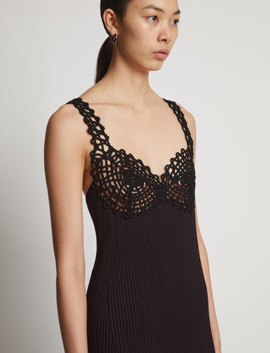 Detail image of model wearing Embroidered Viscose Knit Dress in black