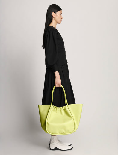 Image of model wearing XL Ruched Tote in LEMONGRASS