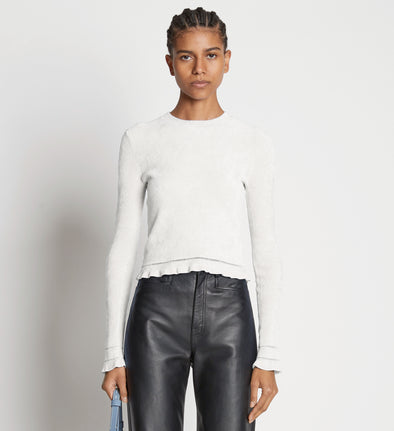 Cropped front image of model wearing Cropped Turtleneck Chenille Sweater in off white