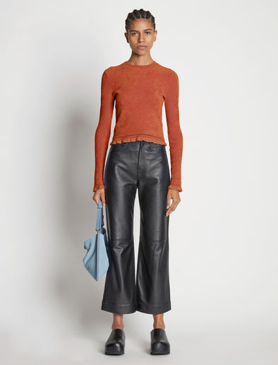 Front image of model wearing Cropped Turtleneck Chenille Sweater in rose