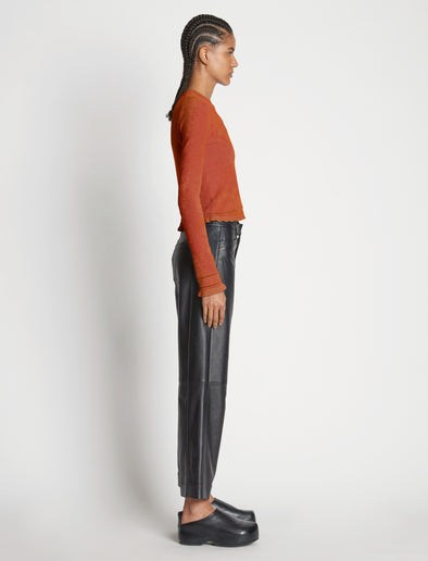 Side image of model wearing Cropped Turtleneck Chenille Sweater in rose