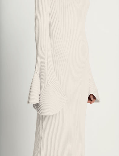 Detail image of model wearing Fluted Rib Knit Dress in ivory