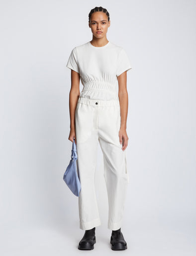 Image of model carrying Minetta Bag in PERIWINKLE in hand
