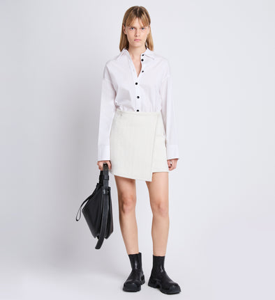 Front full length image of model wearing Tweed Wrap Skirt in OFF WHITE
