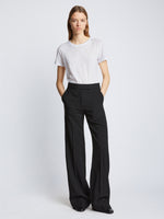 Front full length image of model wearing Short Sleeve T-Shirt in WHITE