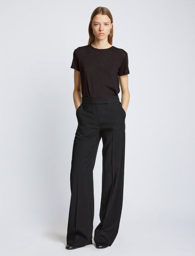 Front full length image of model wearing Short Sleeve T-Shirt in BLACK