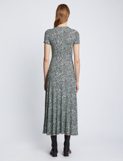 Back full length image of model wearing Slinky Jersey Keyhole Dress in BLACK/WHITE/JADE