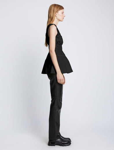Side full length image of model wearing Poplin Gathered Tank Top in BLACK