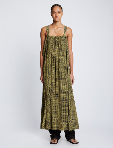 Front full length image of model wearing Viscose Flou Wrap Dress in BLACK/MATCHA with belt untied, styled over black Viscose Suiting Pants