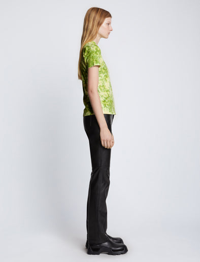 Side full length image of model wearing Tie Dye T-Shirt in GREEN/CITRON