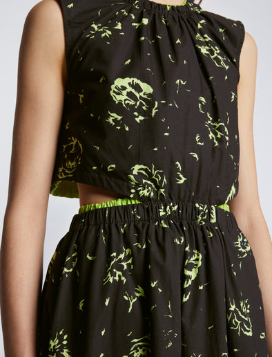 Detail image of model wearing Poplin Cut Out Midi Dress in BLACK/LIME
