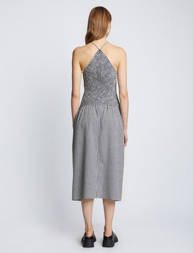 Back full length image of model wearing Gingham Seersucker Smocked Dress in OFF WHITE/BLACK