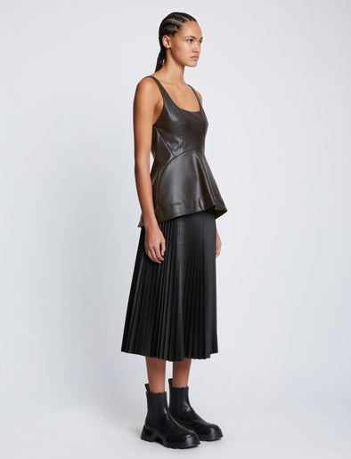 Side full length image of model wearing Faux Leather Bustier Top in BLACK