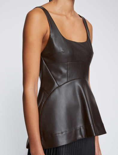 Detail image of model wearing Faux Leather Bustier Top in BLACK