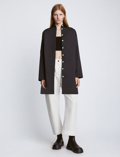 Front full length image of model wearing Soft Poplin Button Down Shirt Dress in BLACK styled over white Solid Cotton Linen Easy Pants