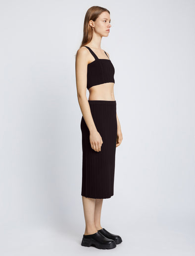 Side full length image of model wearing Pointelle Rib Knit Skirt in BLACK