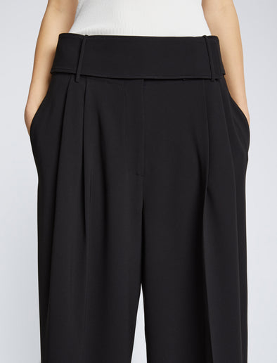Detail image of model wearing Matte Viscose Crepe Pants in BLACK