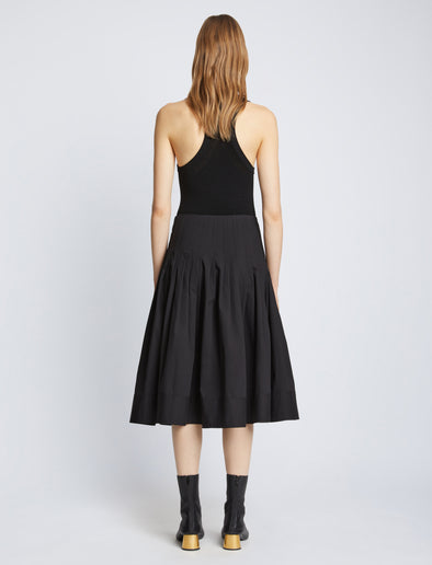 Back image of model in Eco Poplin Wrap Skirt in black