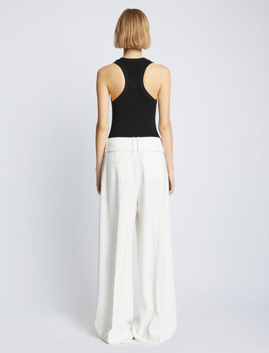 Back full length image of model wearing Matte Viscose Rib Knit Tank in BLACK