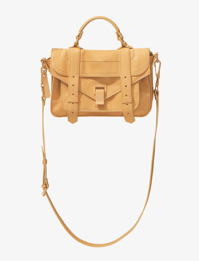 Image of Tonal PS1 Tiny Bag in SAND with strap hanging