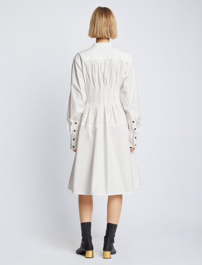 Back full length image of model wearing Eco Poplin Shirt Dress in WHITE