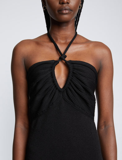 Detail image of model wearing Textured Cotton Knit Halter Dress in BLACK