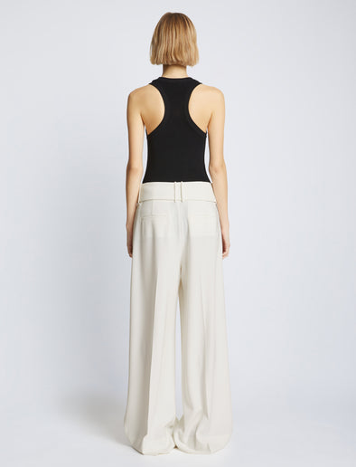 Back full length image of model wearing Matte Viscose Crepe Pants in WHITE