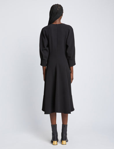 Back full length image of model wearing Matte Viscose Crepe Dress in BLACK