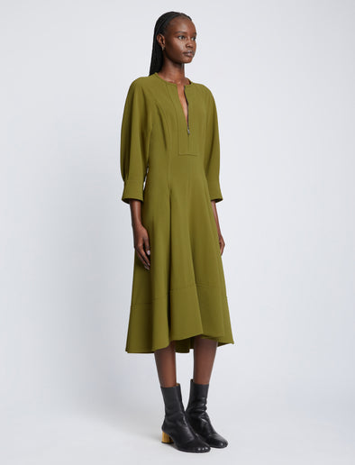 Side full length image of model wearing Matte Viscose Crepe Dress in OLIVE