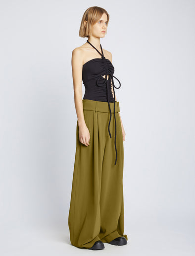 Side full length image of model wearing Matte Viscose Crepe Pants in OLIVE