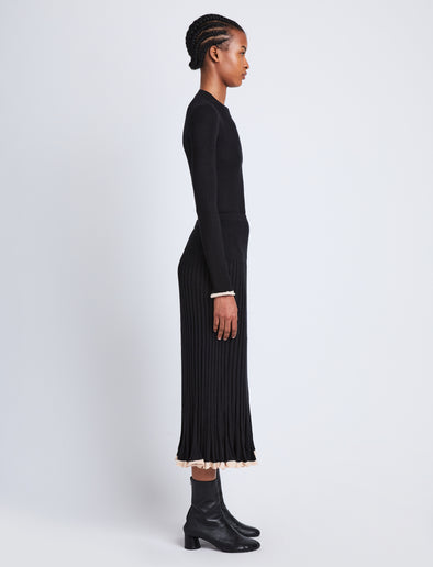 Side full length image of model wearing Silk Cashmere Rib Knit Skirt in BLACK