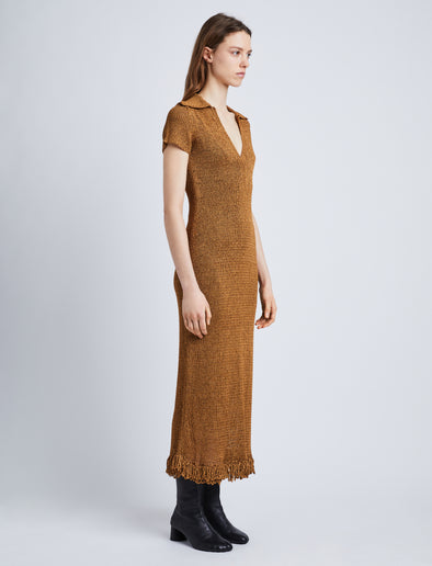 Side full length image of model wearing Ribbon Crochet Fringe Dress in SADDLE