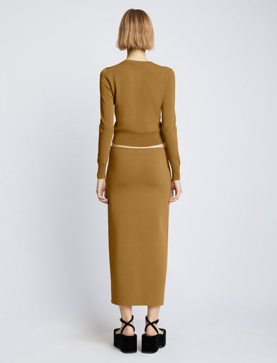 Back full length image of model wearing Silk Viscose Skirt in OCHRE