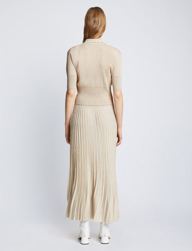 Back full length image of model wearing Metallic Knit Polo in CHAMPAGNE