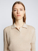 Detail image of model wearing Metallic Knit Polo in CHAMPAGNE
