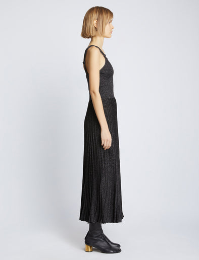 Side full length image of model wearing Metallic Knit Dress in BLACK