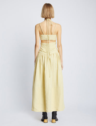 Back full length image of model wearing Viscose Linen Ruched Dress in PARCHMENT