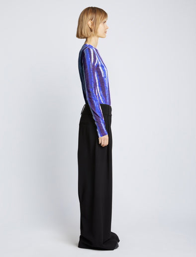 Side full length image of model wearing Painted Stripe T-Shirt in COBALT MULTI