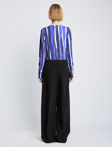 Back full length image of model wearing Painted Stripe T-Shirt in COBALT MULTI