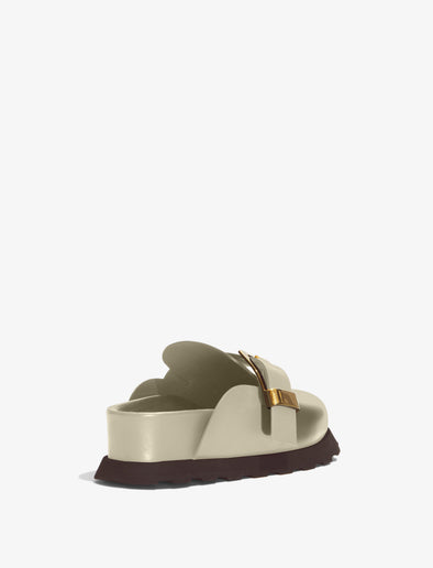 Back 3/4 image of BUCKLE MULES in Natural