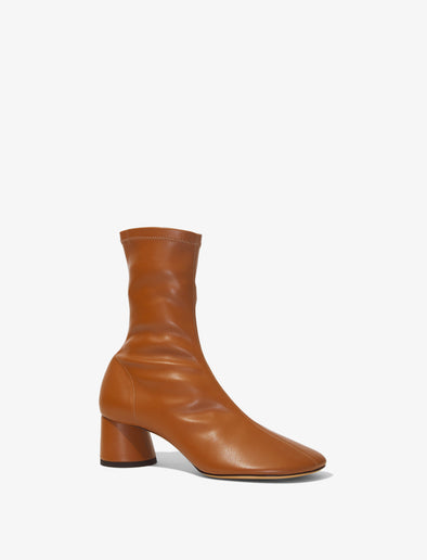 Front 3/4 image of GLOVE STRETCH ANKLE BOOTS in Medium Orange
