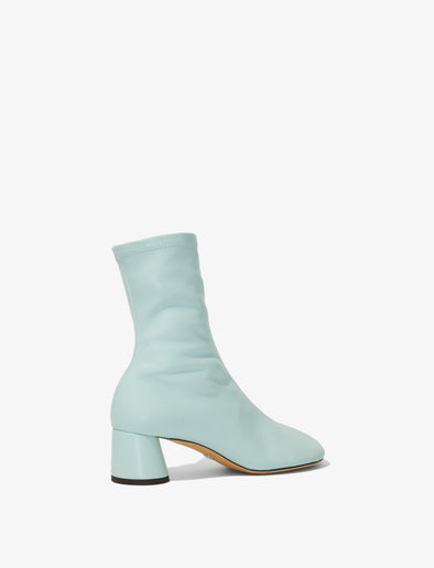 Back 3/4 image of GLOVE STRETCH ANKLE BOOTS in Turquoise/Aqua
