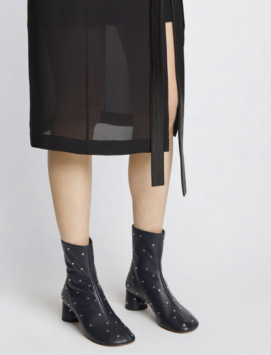 Image of model wearing GLOVE STUDDED BOOTS in Navy