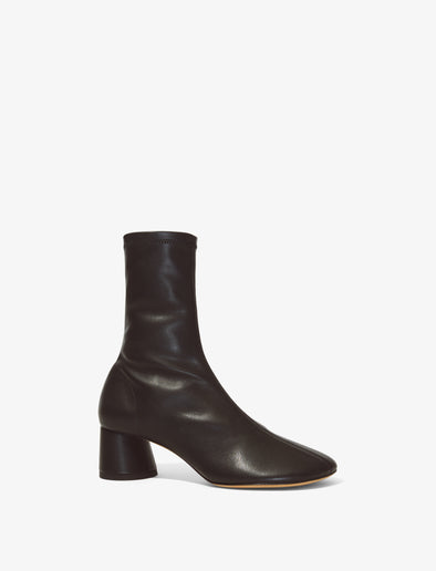 Front 3/4 image of GLOVE STRETCH ANKLE BOOTS in Black