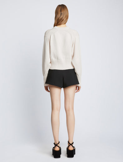 Back full length image of model wearing Textured Cotton Sweater in IVORY