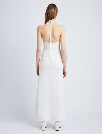 Back full length image of model wearing Textured Cotton Knit Halter Dress in IVORY
