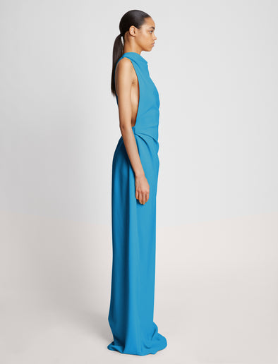 Side image of model wearing Matte Viscose Crepe Backless Dress in turquoise