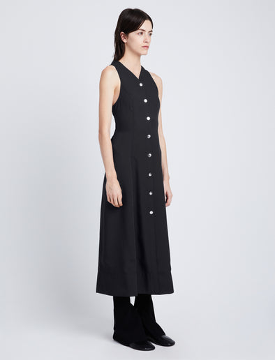 Side image of model wearing Drapey Suiting Button Front Dress in BLACK